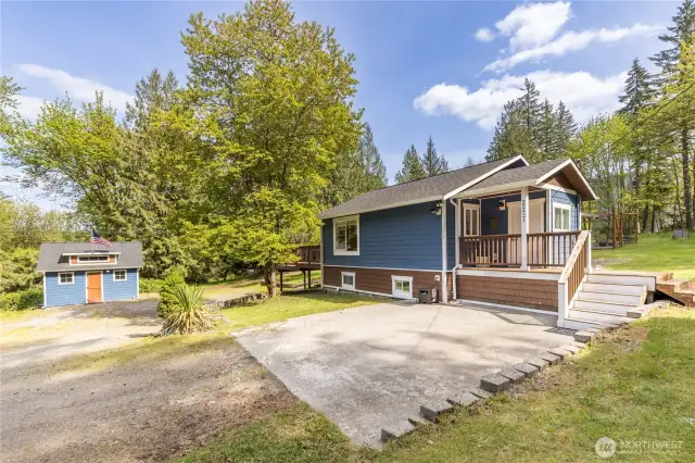 Welcome to this secluded property on a shy acre!