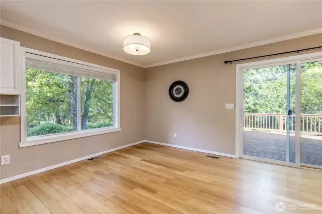 Dining room with big windows to take in the serene natural setting