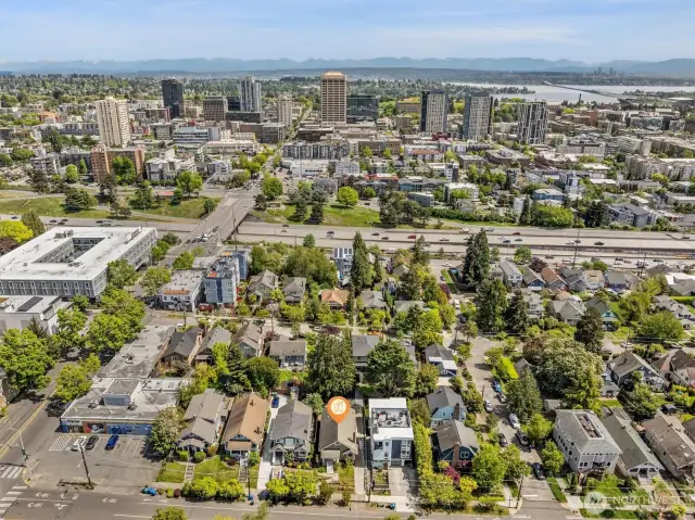 Aerial photo looking west. You can see the UW and Lake Washington from this photo. Only minutes to the UW, downtown, Amazon & 520. Walking distance to shopping, cafes, restaurants, etc. 89 Walk score and 82 bike score!. Only minutes to the UW, downtown, Amazon & 520. Walking distance to shopping, cafes, restaurants, etc.