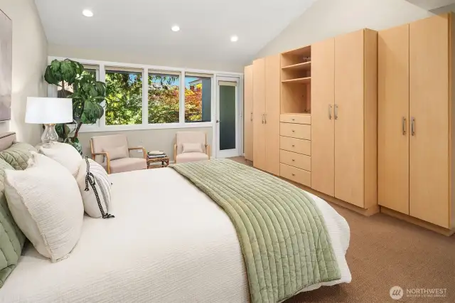 Custom California Closets wall system allows for plenty of storage.