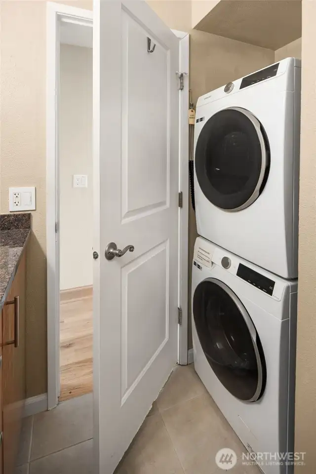 Newer full size washer and dryer conveniently located in upstairs bathroom.