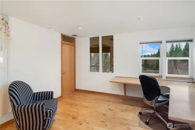 1221. The second upstairs bedroom features a built-in desk with a mountain view!