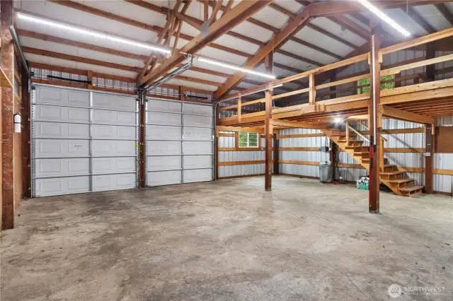 1291. Inside you can see the tall garage doors and the loft area to your left.
