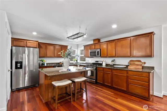 Huge kitchen with plenty of cupboard space and lots of counterspace.