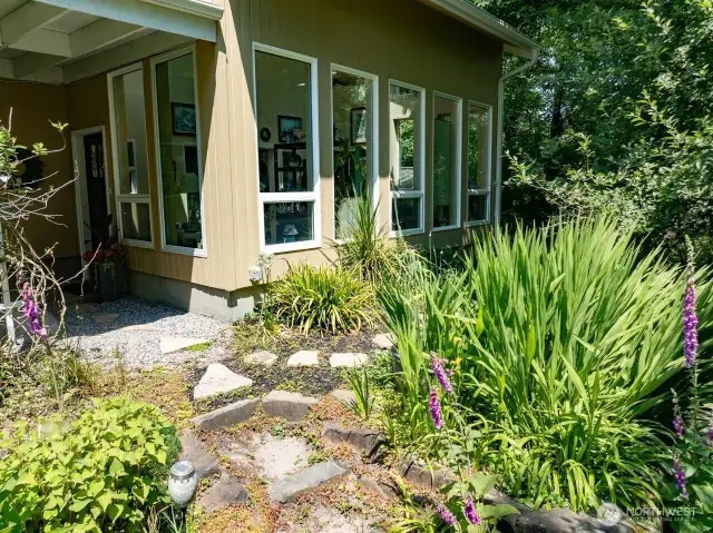 Sunroom is the main entrance to this home.