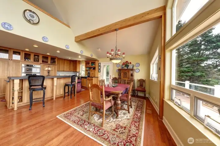 Kitchen shares the same ocean view. Convenient bar to have a quick snack or entertainment. All cherry cabinets. Bar has hidden storage underneath.
