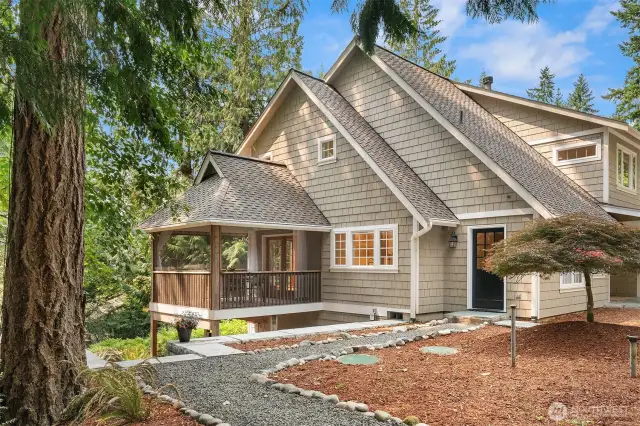 This NW Contemporary 3,000+ sq/ft home has a timeless design with thoughtful touches throughout. The screened in deck is a prime example of what makes this home so special. The side door leads you into the mudroom, utility room, and kitchen.