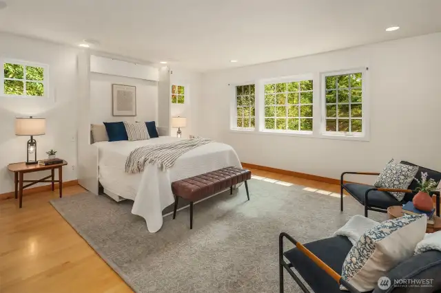 Very roomy second floor bedroom boasts a murphy bed and walk-in closet.