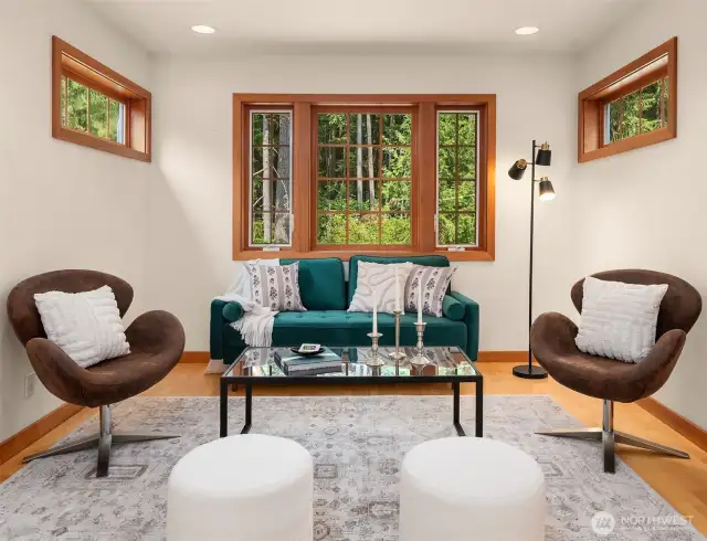 Second floor flex room overlooks the main level living room. The photo does not display the true scale of this space.