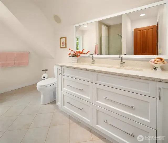 Second floor bathroom with separate tub and shower plus undermount trough sink.