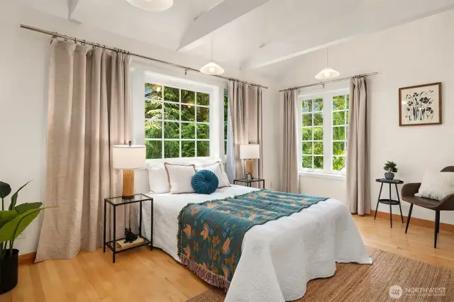 The west bedroom on the second floor features a walk-in closet and a secret entrance to a private loft