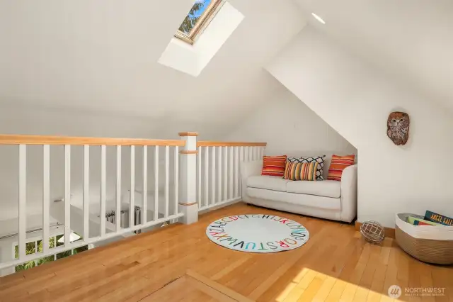 Loft above the west bedroom - check out the skylight. A dreamy space to spend time resting or playing.
