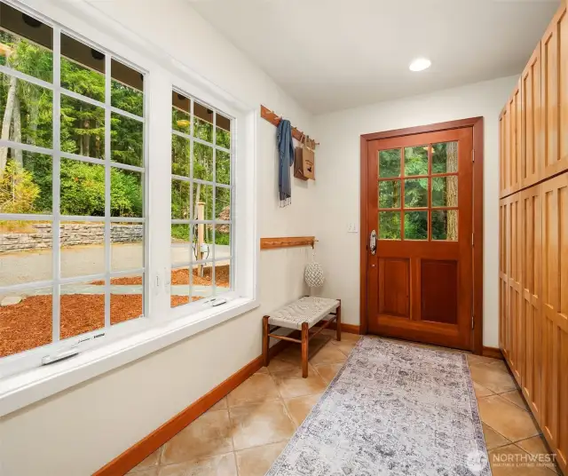 Ample storage in the mudroom which is next to the kitchen. No tracking dirt through the house when you are bringing in the groceries.