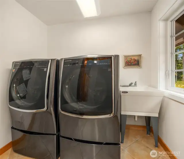 Almost new LG Signature laundry set with a second washer for delicates. The laundry facility is adjacent to the mudroom for convenience.