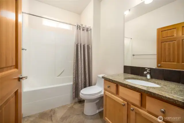 Guest Full bath with high stature toilet and vanity