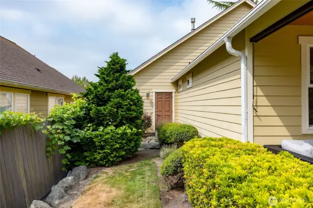 Side yard showing garage access door