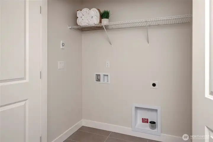 Convenient laundry closet (Model Home Lot C101)