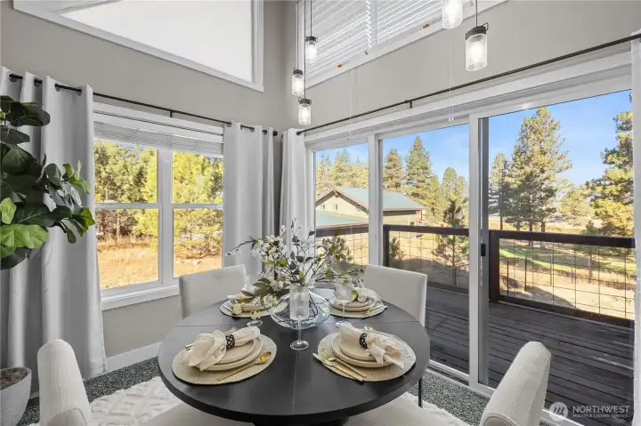 Dining room surrounded by picture windows