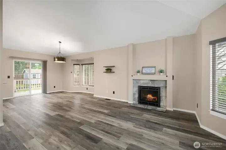 New fireplace with custom tile surround.
