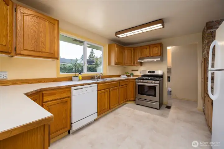 Spacious, well laid out kitchen with lots of counter and storage space.