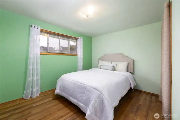 Bedroom number 3 also offers hardwood floors. All the bedrooms are fairly good sized for a mid-century home.