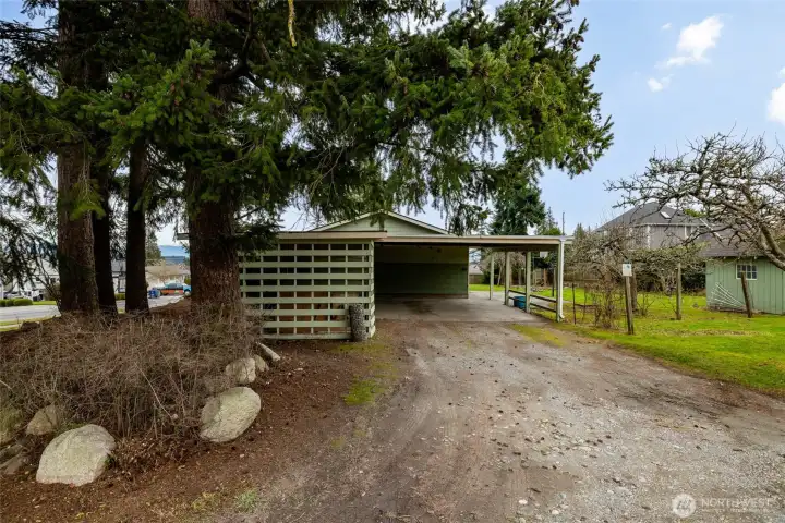Driveway covered carport and storage shed. This home has great off street parking.