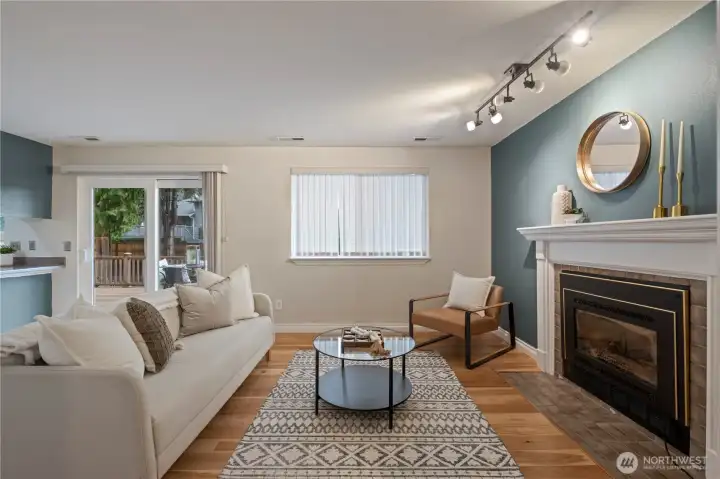Timeless color choices make this home so warm and inviting. The gas fireplace w/fan makes those chilly nights even cozier!