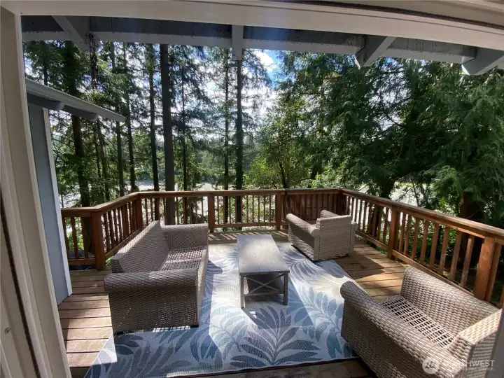 Relax on the large upper deck with views of the Bay