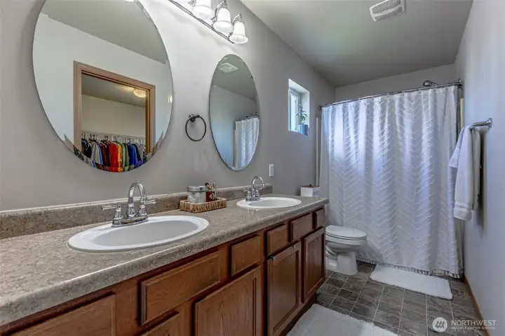 Owner's full bath with a soaking tub.