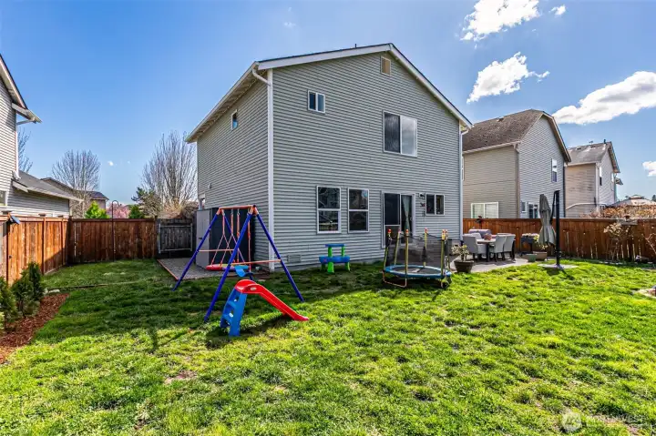 Extra space in the side yard! Shed stays too.