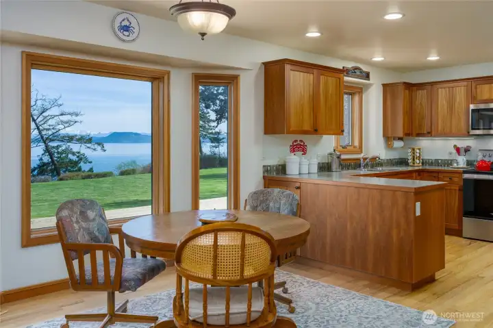 Enjoy your morning meal while watching Mt Baker peaking behind the fir tree.