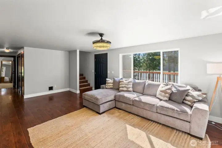 Open living room with large windows for plenty of natural light