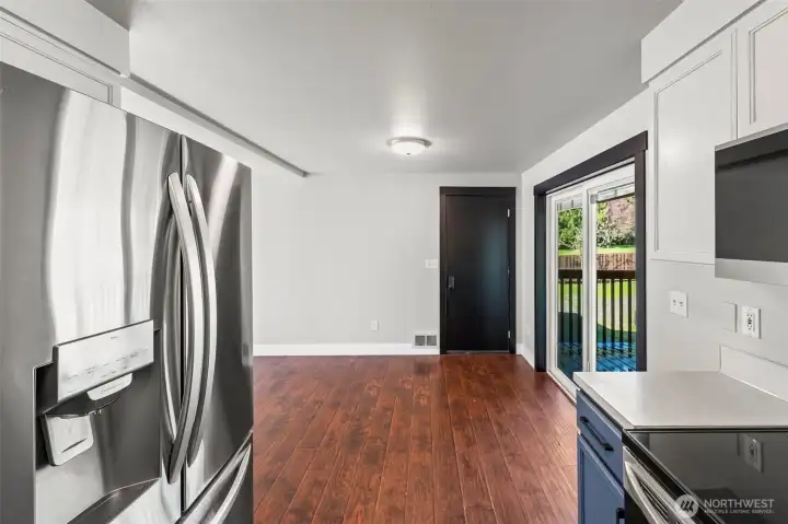 Kitchen looking towards front door and garage