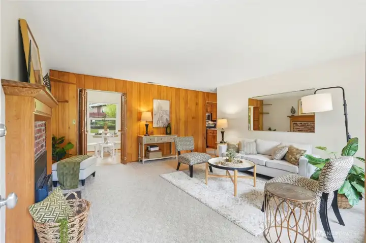 The living room flows into the kitchen and dining room.