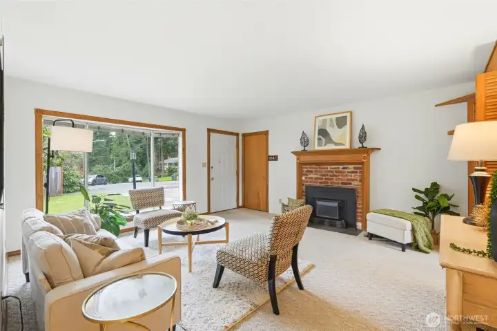 Large coat closet and a wood burning fireplace.