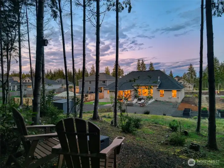 End your days here, watching the sunset sky through the trees, the world slowing down around you, and a quiet moment that feels entirely your own.