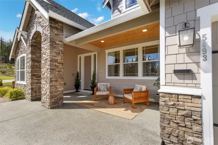 An inviting front porch welcomes you home, creating a warm, welcoming first impression and a place that instantly feels comfortable the moment you arrive.