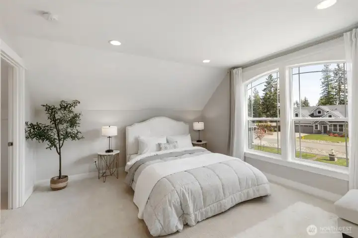 Private second-level suite offering a peaceful retreat with soft natural light, spacious layout, and a tucked-away feel.