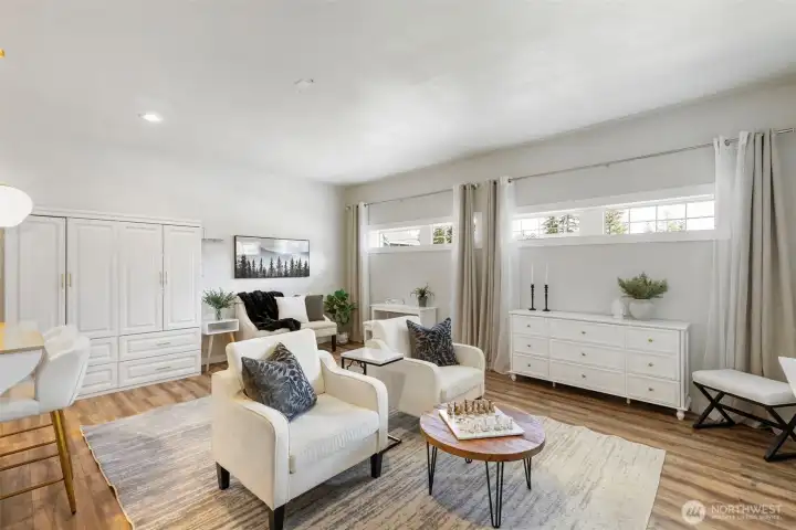 Versatile additional living space with abundant natural light and private feel, perfect for a media room or multi-generational living.