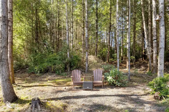 Secluded seating tucked beneath the trees, your own private spot to unwind, sip coffee, or enjoy the quiet beauty of nature.