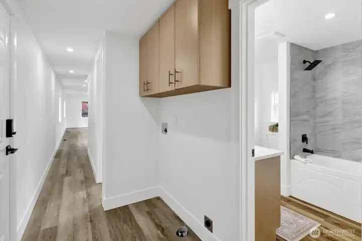Laundry space with good amount of storage above Laundry space with good amount of storage above