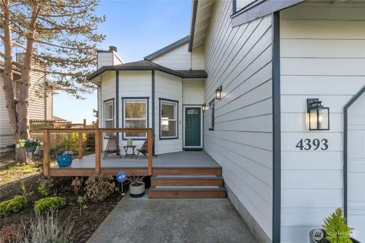 Covered front porch provides a welcoming entry and comfortable outdoor space to relax or visit with neighbors. Covered front porch provides a welcoming entry and comfortable outdoor space to relax or visit with neighbors.