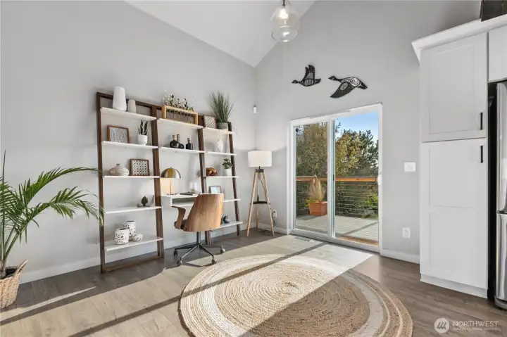 Vaulted ceilings and expansive windows enhance the sense of space and connection to the outdoors. Vaulted ceilings and expansive windows enhance the sense of space and connection to the outdoors.