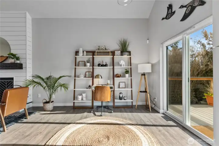 Flexible main living area offers space for a home office, play area, or additional lounge seating. Flexible main living area offers space for a home office, play area, or additional lounge seating.