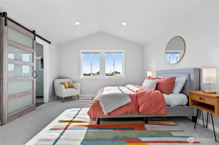 Spacious primary suite offers vaulted ceilings, abundant natural light, and a calming atmosphere designed for comfort and relaxation. Spacious primary suite offers vaulted ceilings, abundant natural light, and a calming atmosphere designed for comfort and relaxation.