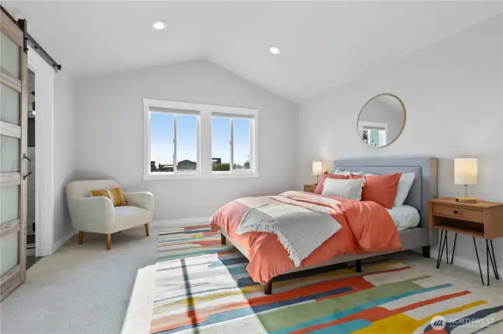 Primary bedroom features large windows, soft neutral finishes, and generous space for a seating area or additional furnishings. Primary bedroom features large windows, soft neutral finishes, and generous space for a seating area or additional furnishings.