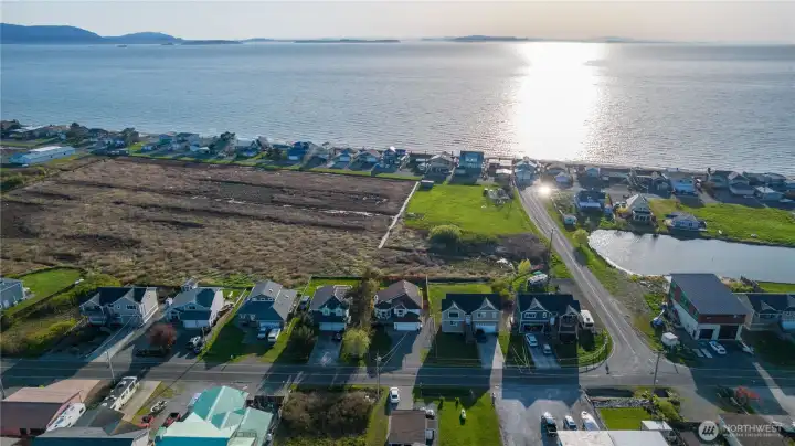 Neighborhood setting combines residential living with nearby water access and open views. Neighborhood setting combines residential living with nearby water access and open views.