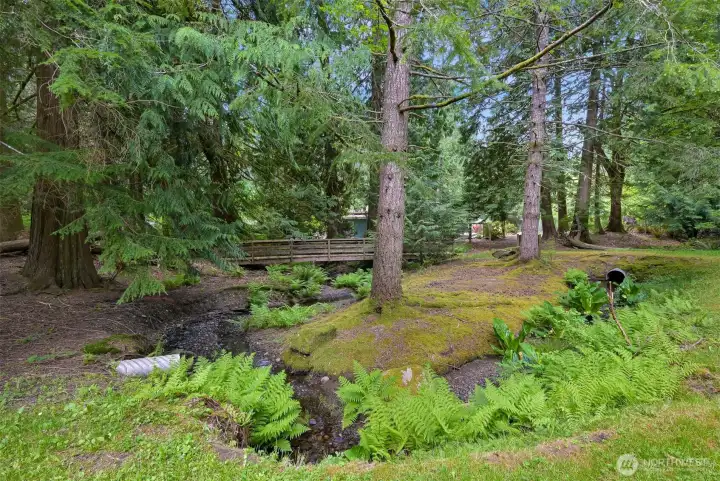 Nearby Little Strawberry Park features a natural creek and mature evergreens create a peaceful outdoor setting with a true Pacific Northwest feel.