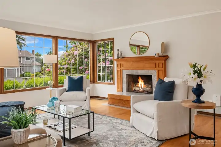 Lavish Living Room Featuring Hardwood Floors and Gas Fireplace
