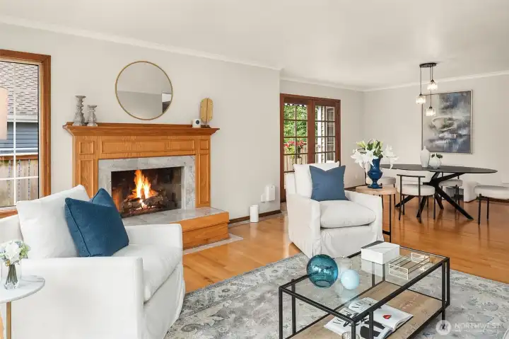 Spacious Living Room with Streaming Light Filled Room from Walls of Windows